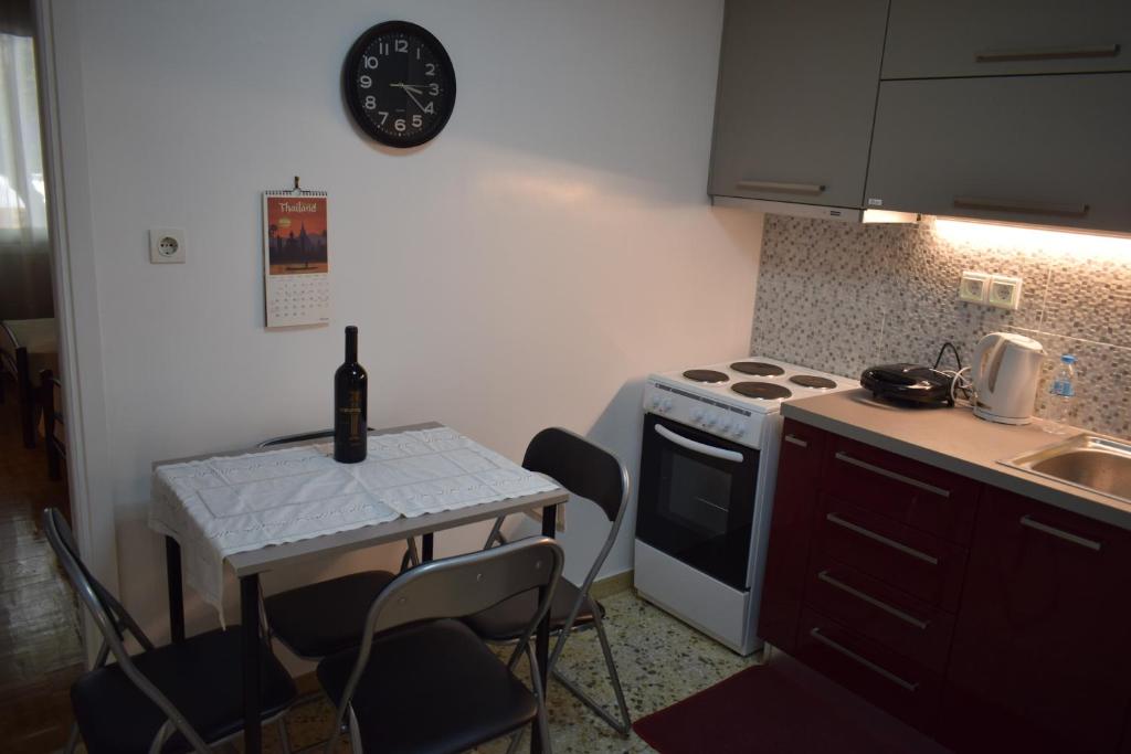 Kuchyň nebo kuchyňský kout v ubytování George apartment