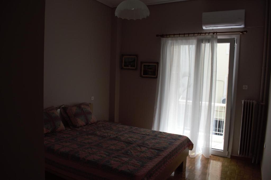 Postel nebo postele na pokoji v ubytování George apartment