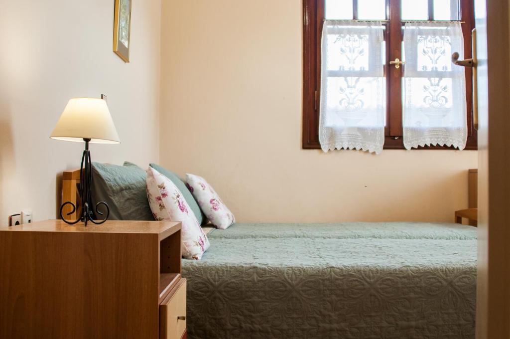 Postel nebo postele na pokoji v ubytování Casa Elaia
