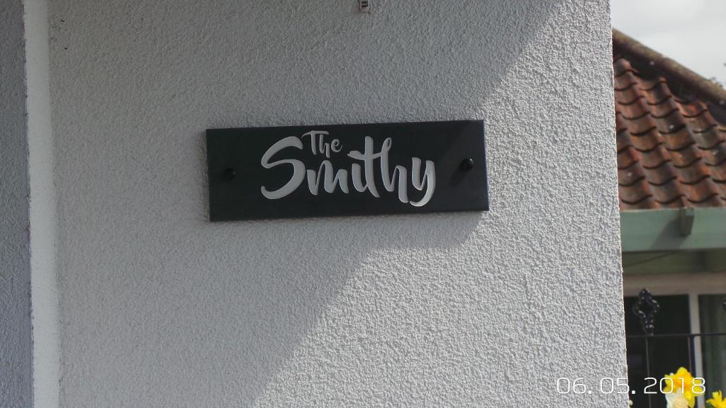 Certifikát, hodnocení, plakát nebo jiný dokument vystavený v ubytování The Smithy