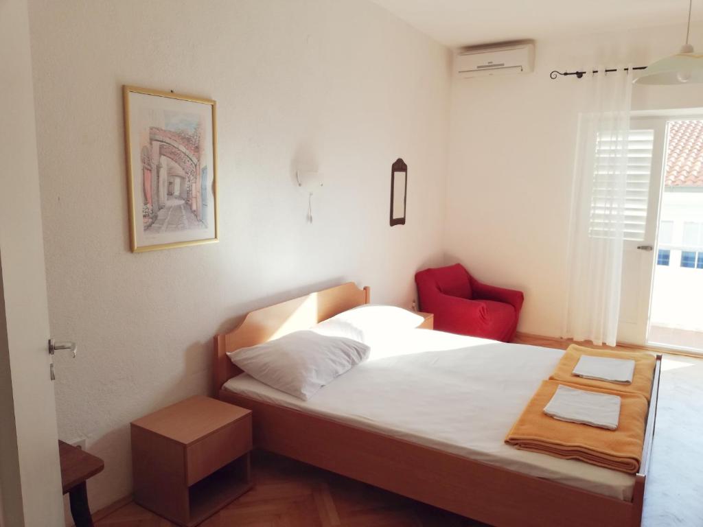 Postel nebo postele na pokoji v ubytování Marika Seaside Retreat-Drašnice