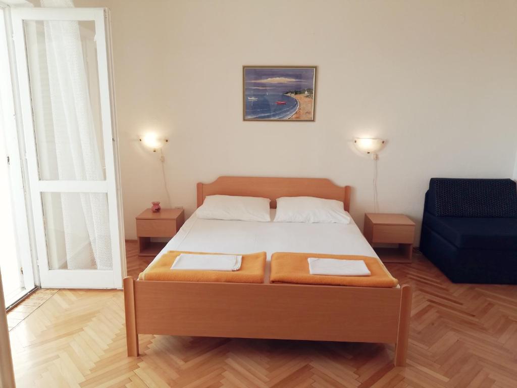 Postel nebo postele na pokoji v ubytování Marika Seaside Retreat-Drašnice
