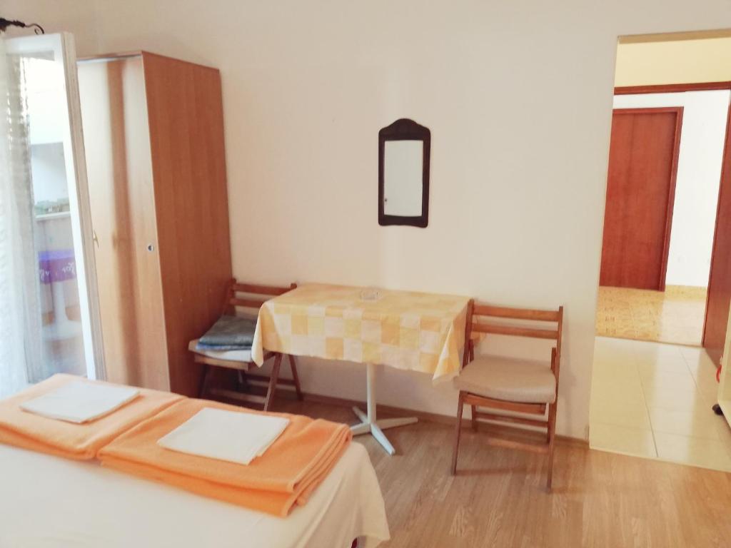 Postel nebo postele na pokoji v ubytování Marika Seaside Retreat-Drašnice