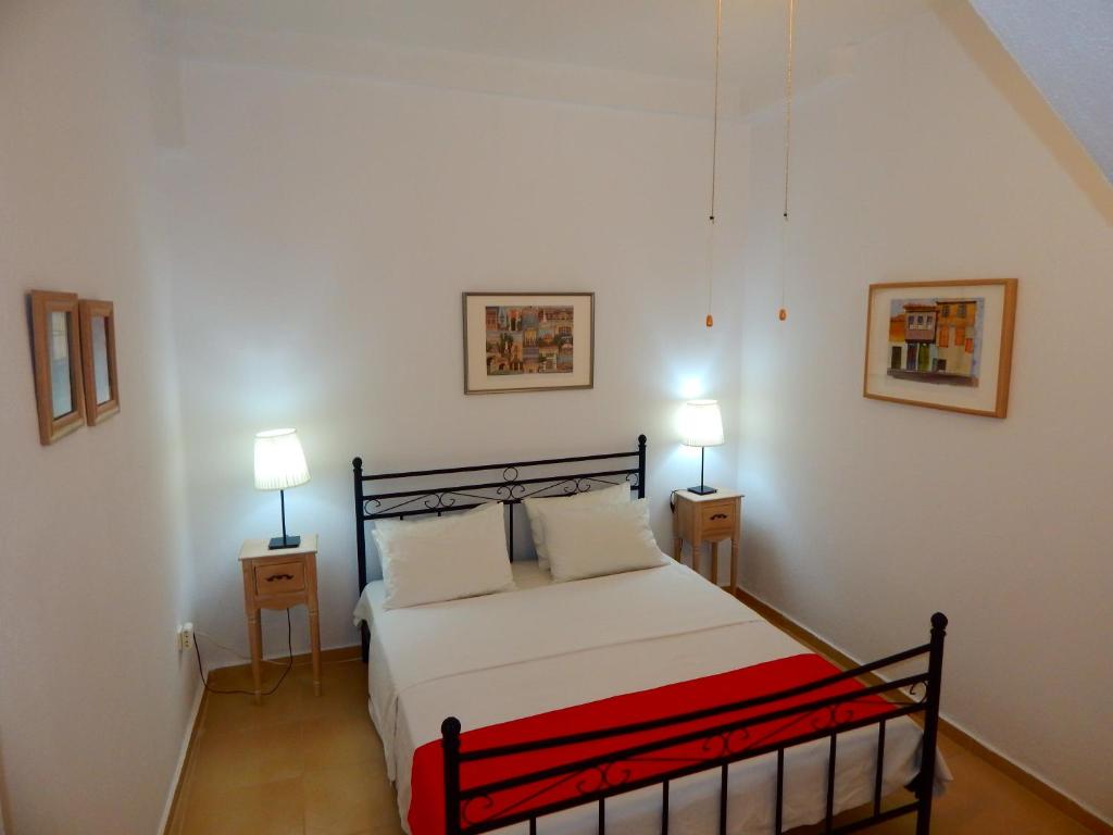 Postel nebo postele na pokoji v ubytování Kripis Studio Paliouri
