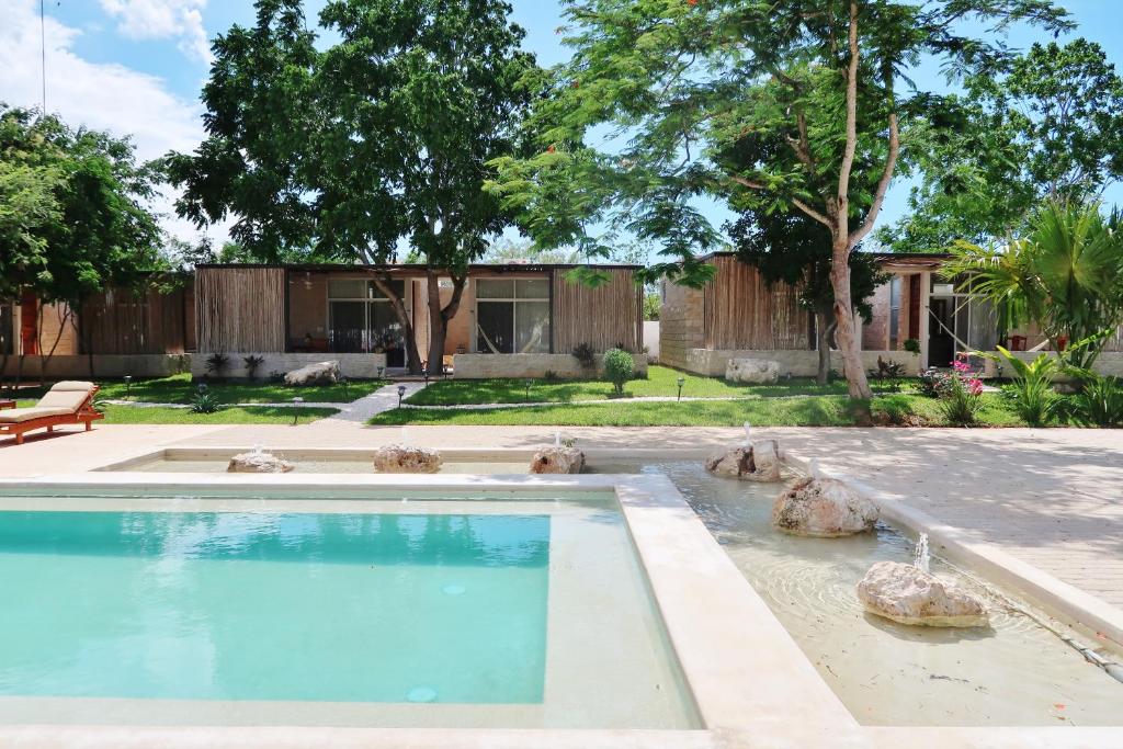 Bazén v ubytování Hotel Casa de Campo Conkal Merida nebo v jeho okolí
