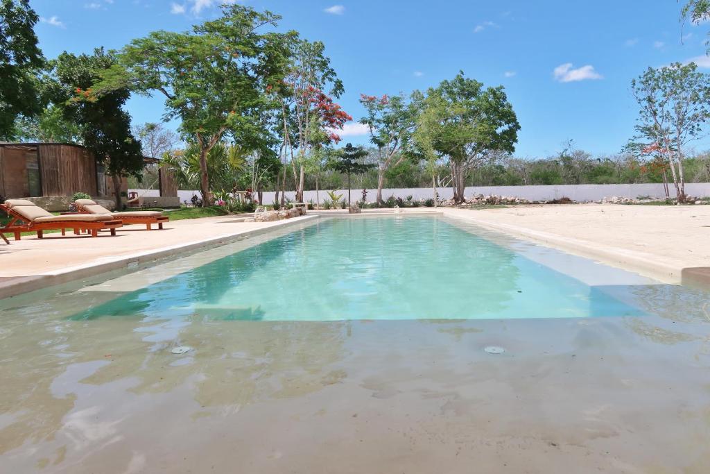 Bazén v ubytování Hotel Casa de Campo Conkal Merida nebo v jeho okolí