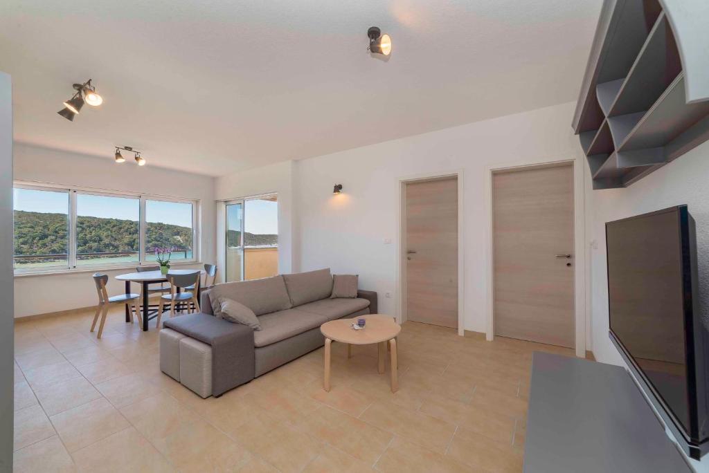 TV a/nebo společenská místnost v ubytování Sunset House