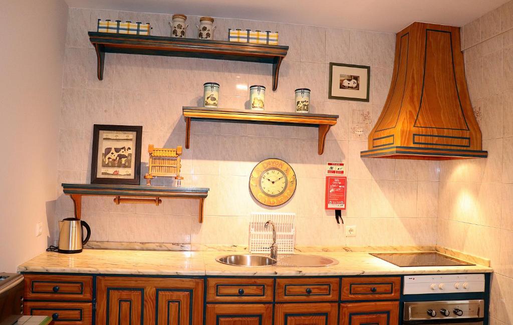 Virtuvė arba virtuvėlė apgyvendinimo įstaigoje Porto Patricio Apartments