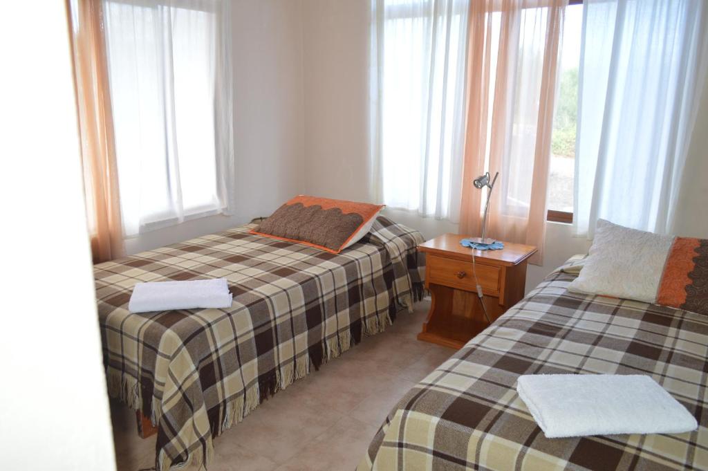 Postel nebo postele na pokoji v ubytování Casa de Lelia
