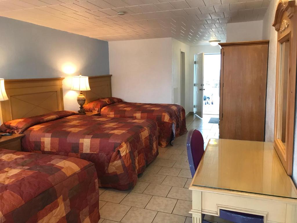 Postel nebo postele na pokoji v ubytování El Ray Motel