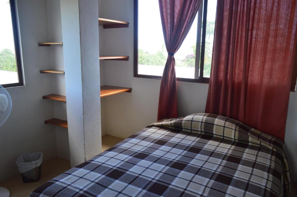 Postel nebo postele na pokoji v ubytování Casa de Lelia