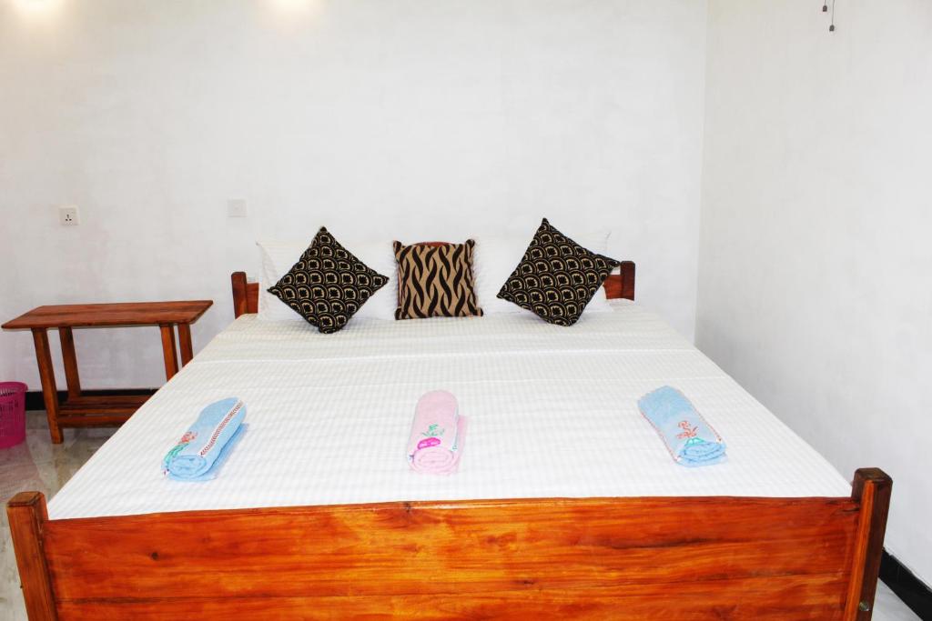 Postel nebo postele na pokoji v ubytování Freedom Home Stay