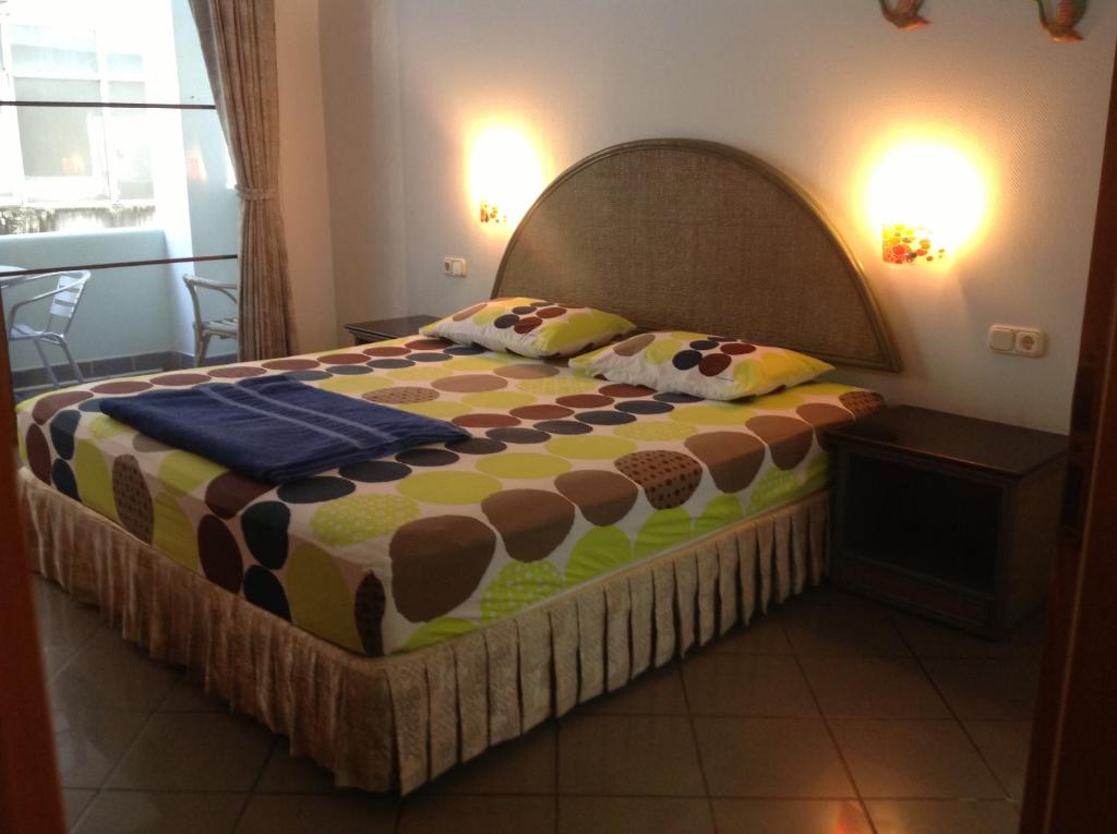 
A bed or beds in a room at Pension Zum Ross

