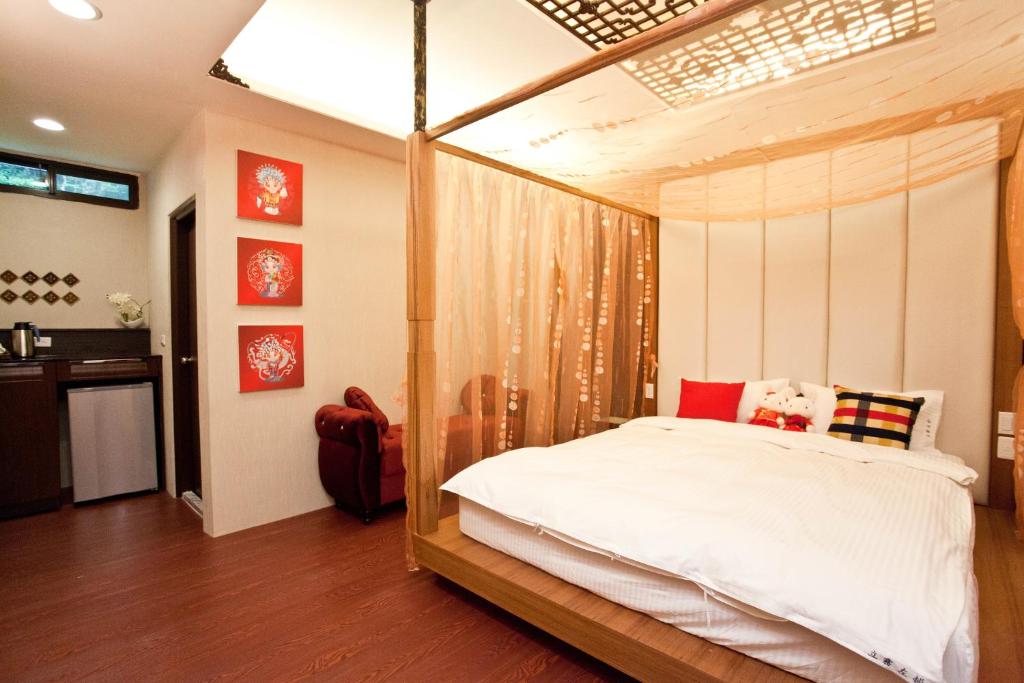 Voodi või voodid majutusasutuse Li Wu Zuo Cun B&B toas