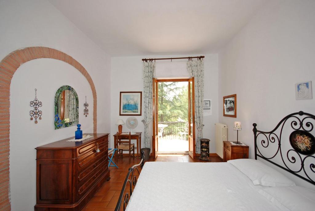 Posteľ alebo postele v izbe v ubytovaní Villa Remignoli