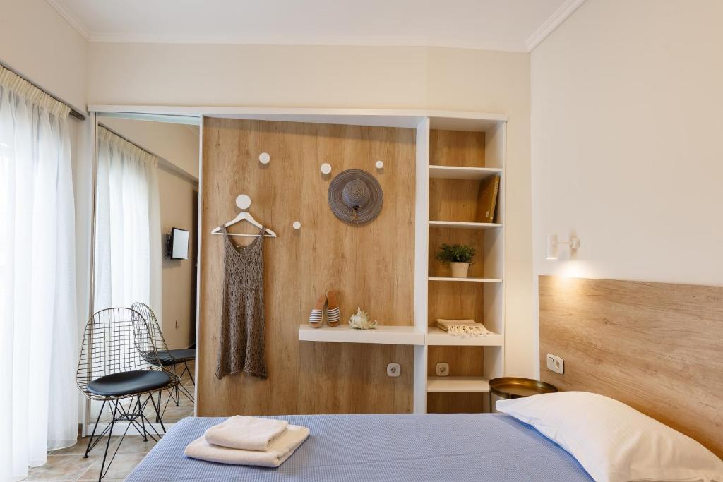 Postel nebo postele na pokoji v ubytování Marialena Hotel