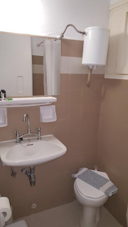 Kúpeľňa v ubytovaní Aratos Hotel
