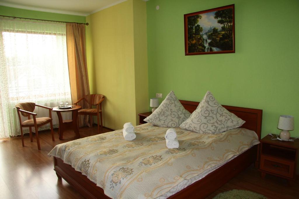 Postel nebo postele na pokoji v ubytování Pyate Koleso