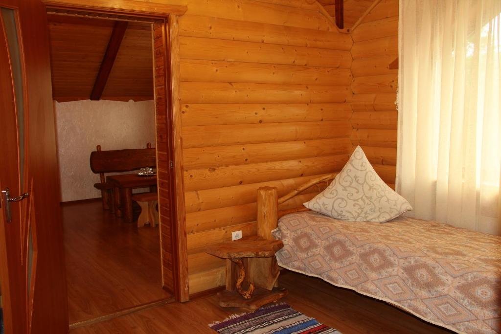 Postel nebo postele na pokoji v ubytování Pyate Koleso