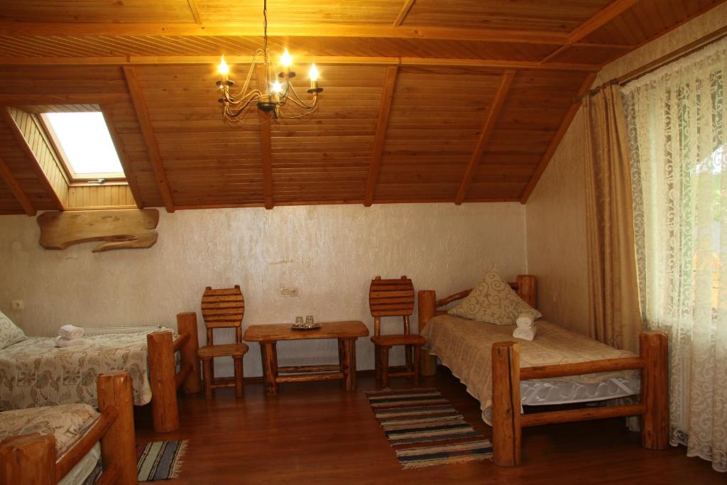 Postel nebo postele na pokoji v ubytování Pyate Koleso