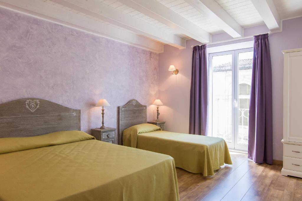 Postel nebo postele na pokoji v ubytování B&B Apollo