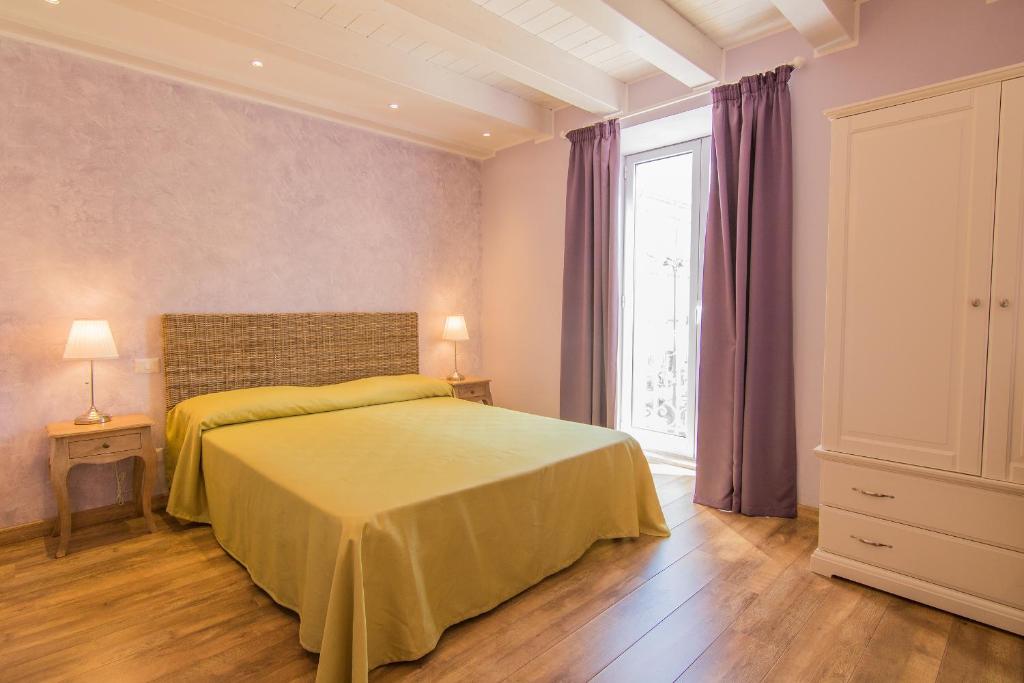 Postel nebo postele na pokoji v ubytování B&B Apollo