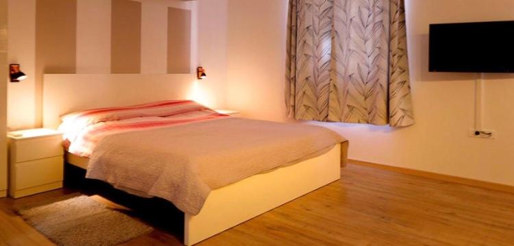 Postel nebo postele na pokoji v ubytování Studio apartman Dado