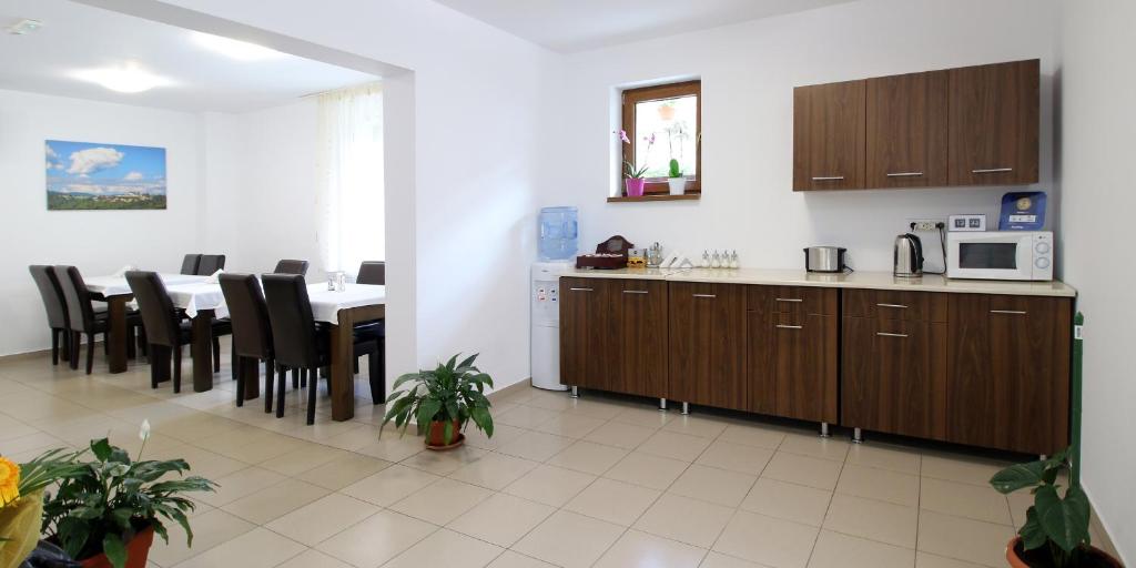 Kuchyň nebo kuchyňský kout v ubytování Casa Micu