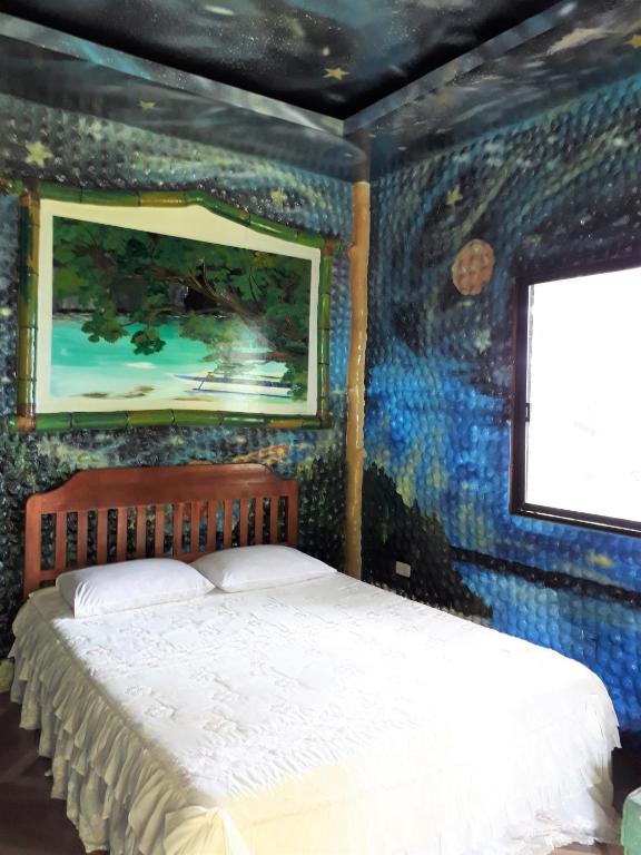 Postel nebo postele na pokoji v ubytování Dabdab Tourist Inn