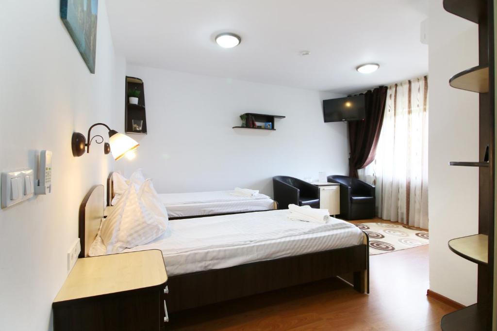 Postel nebo postele na pokoji v ubytování Casa Micu