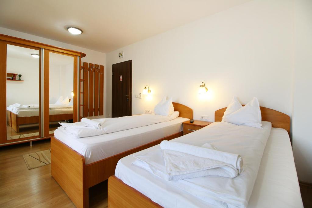 Postel nebo postele na pokoji v ubytování Casa Micu