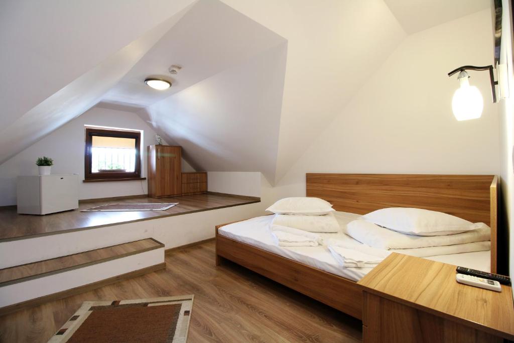 Postel nebo postele na pokoji v ubytování Casa Micu