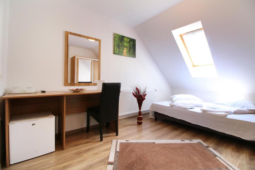 Postel nebo postele na pokoji v ubytování Casa Micu