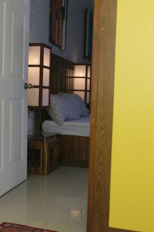Postel nebo postele na pokoji v ubytování Gomez Guest House