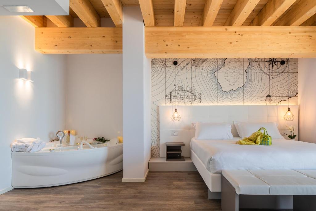 Postel nebo postele na pokoji v ubytování Hotel Elite