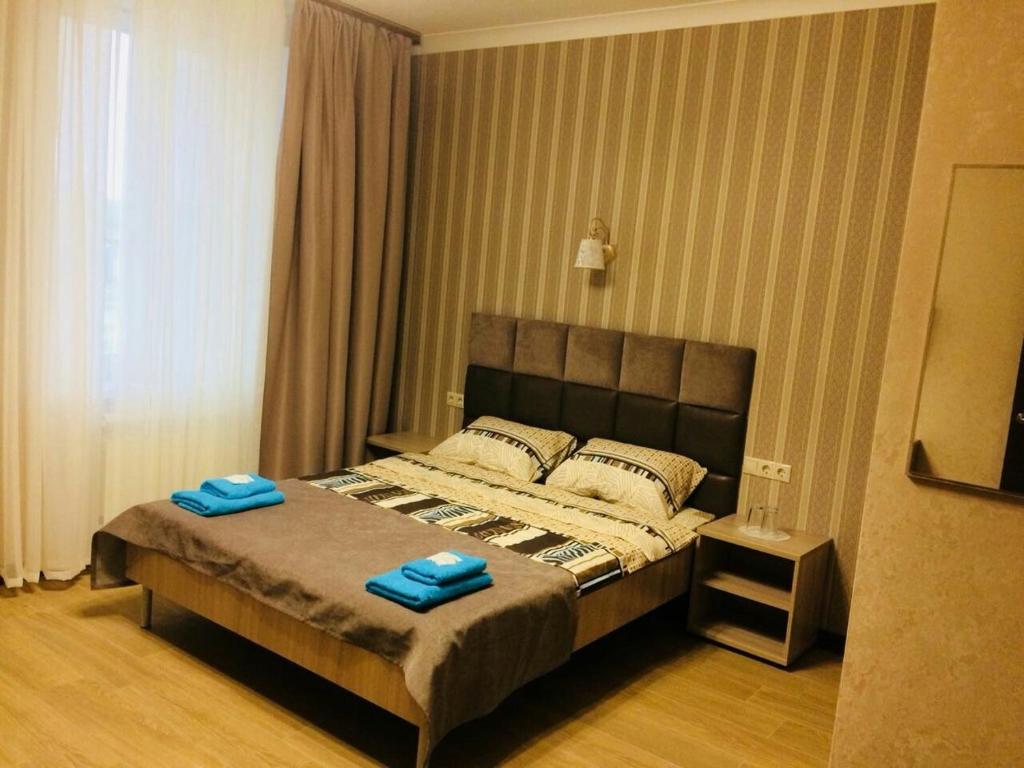 Un pat sau paturi într-o cameră la Motel Ilikom