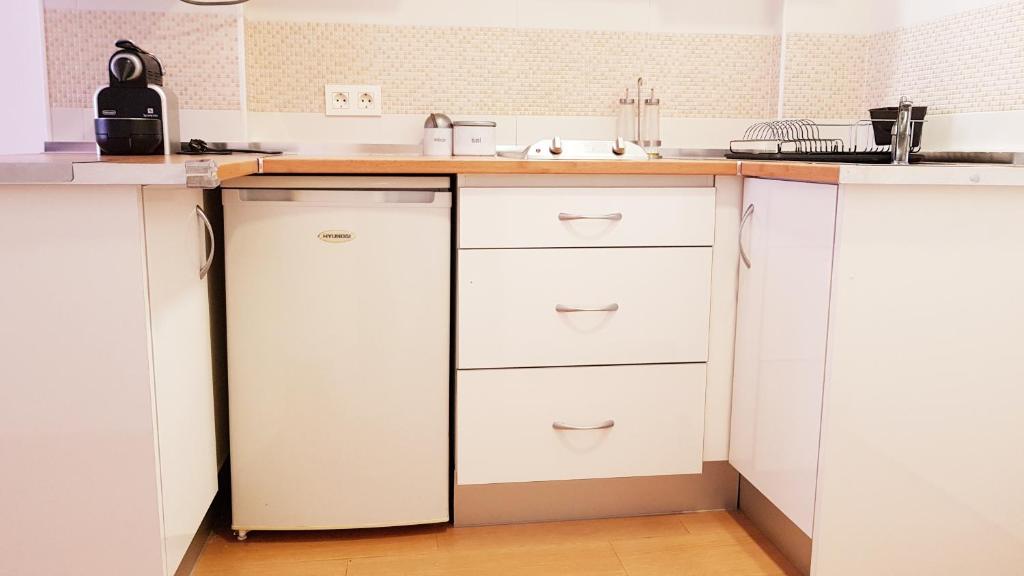 A kitchen or kitchenette at Alda Benalmadena