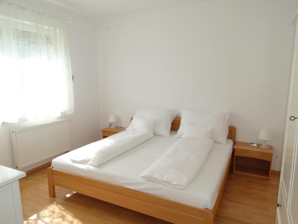 Postel nebo postele na pokoji v ubytování House Magnolia