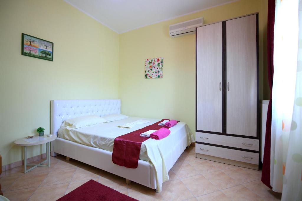 Postel nebo postele na pokoji v ubytování My Home Guest House