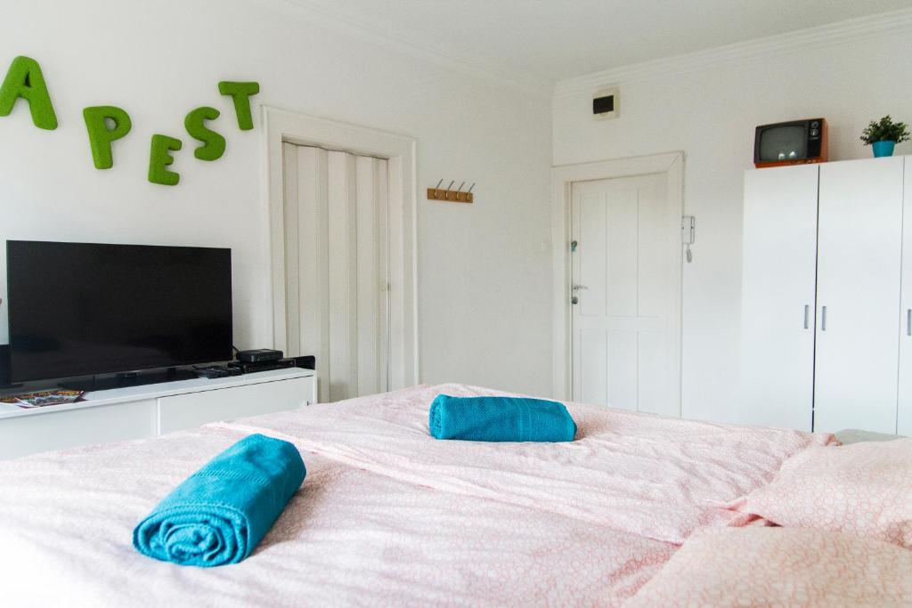 Posteľ alebo postele v izbe v ubytovaní Queen Bed Central Budapest