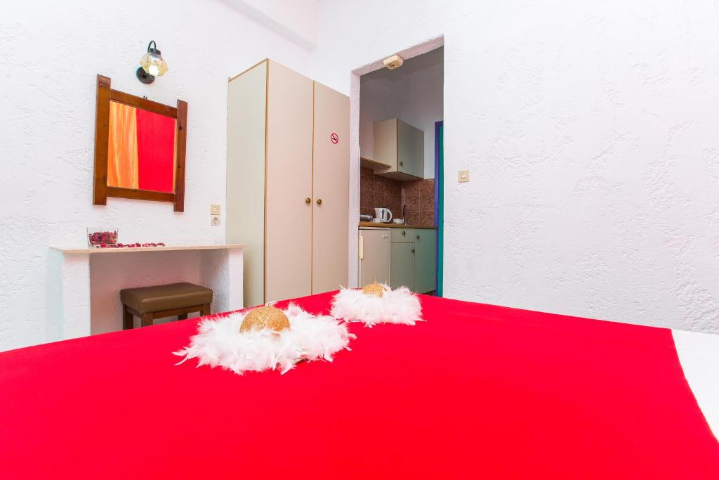 Postel nebo postele na pokoji v ubytování Litsa Studios