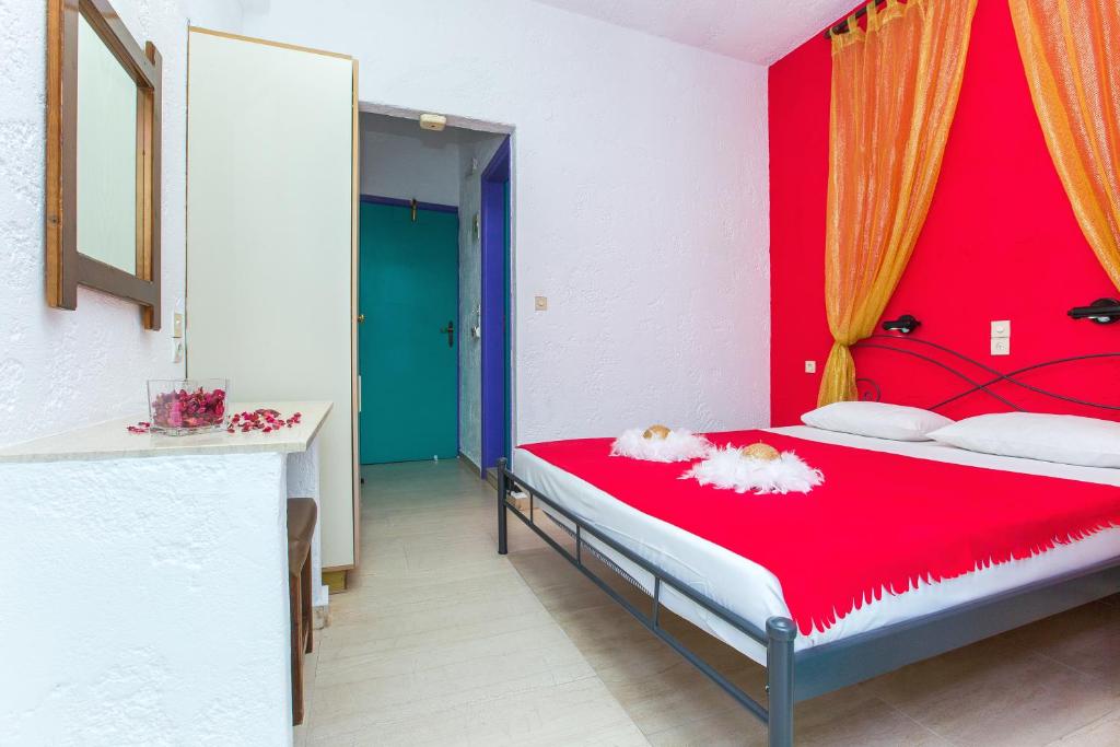 Postel nebo postele na pokoji v ubytování Litsa Studios