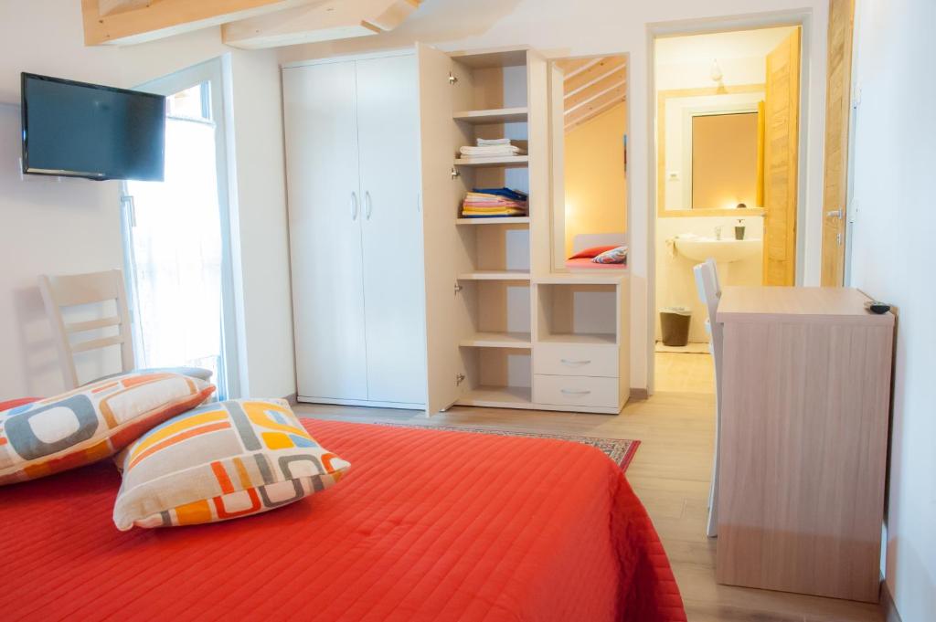 Postel nebo postele na pokoji v ubytování b&b Casa Tavernaro