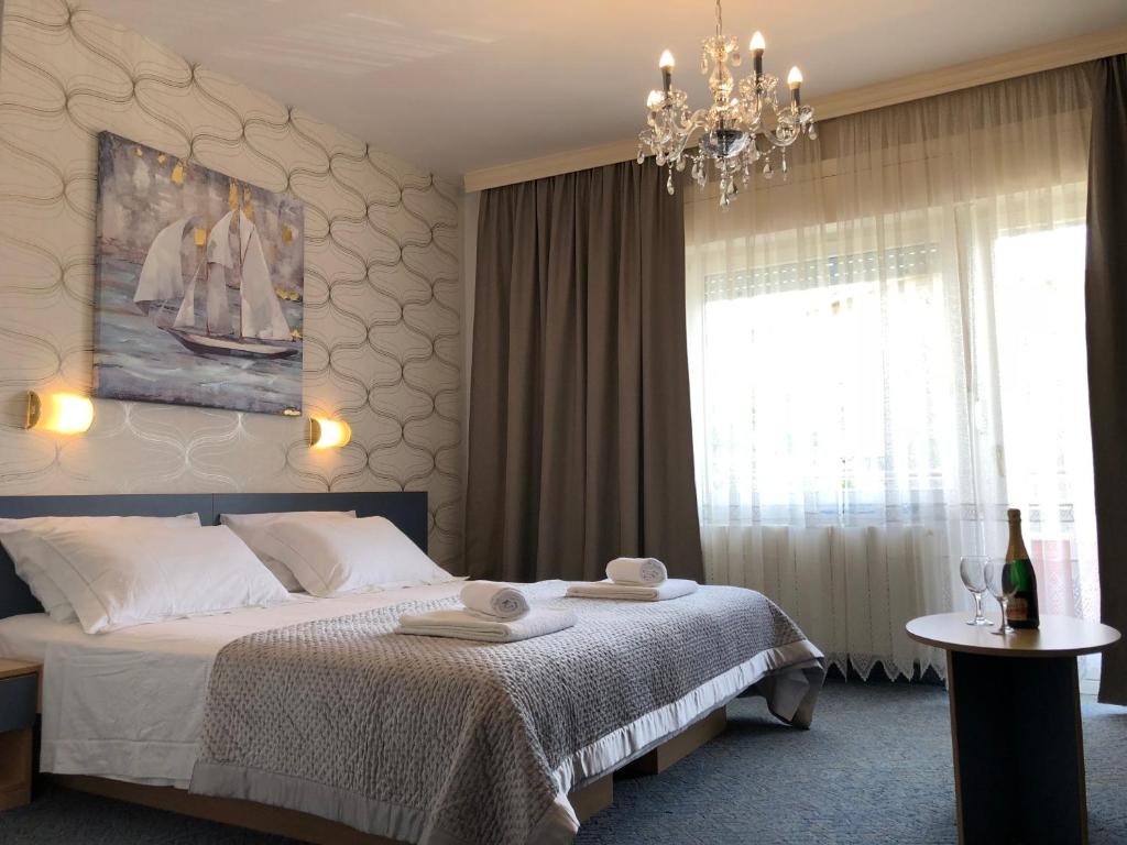 Posteľ alebo postele v izbe v ubytovaní Rooms Ana
