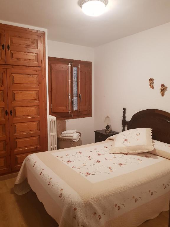 Rúm í herbergi á Casa Simón