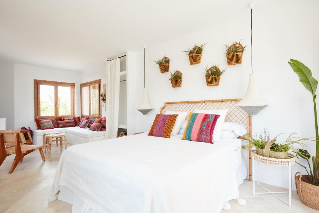 Postel nebo postele na pokoji v ubytování Can Tres Formentera