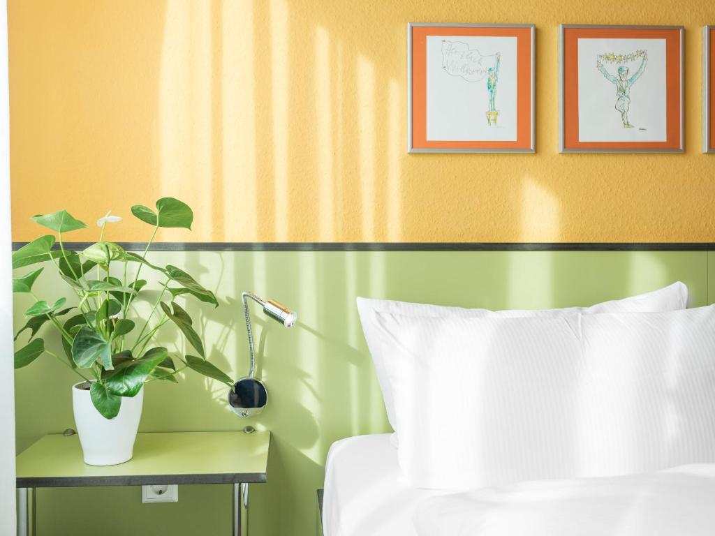 Postel nebo postele na pokoji v ubytování viavelo hotel