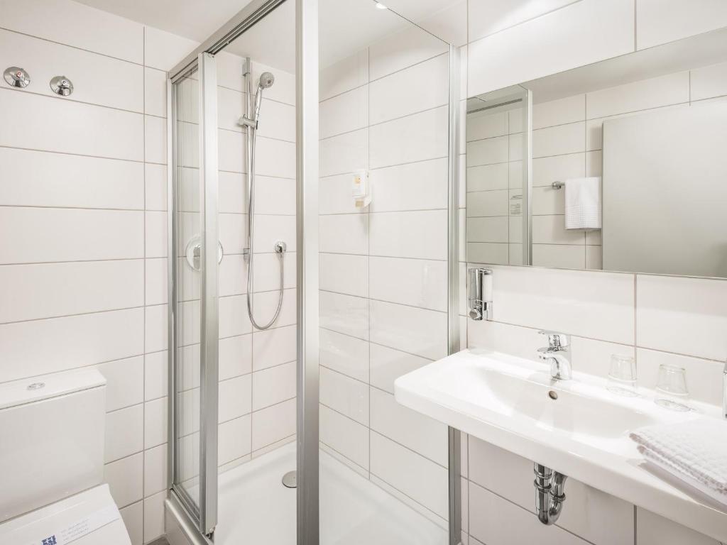 Koupelna v ubytování viavelo hotel