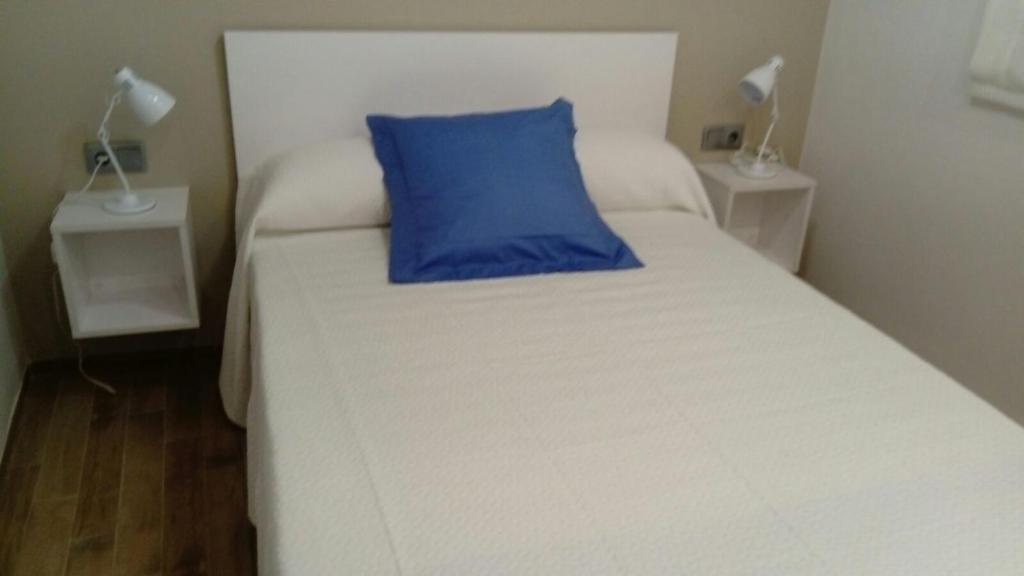 Postel nebo postele na pokoji v ubytování Apartamento frente al mar