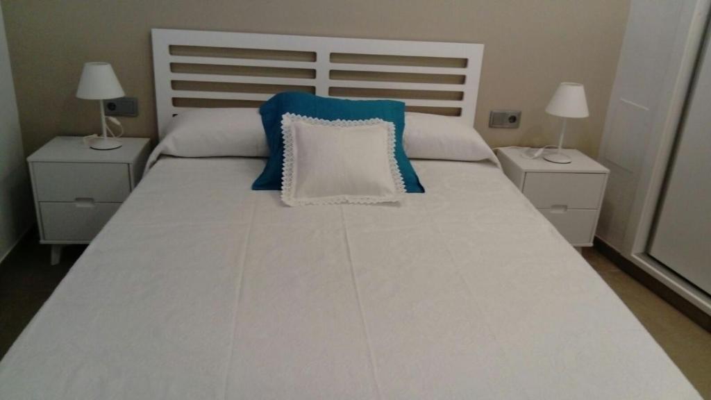 Postel nebo postele na pokoji v ubytování Apartamento frente al mar